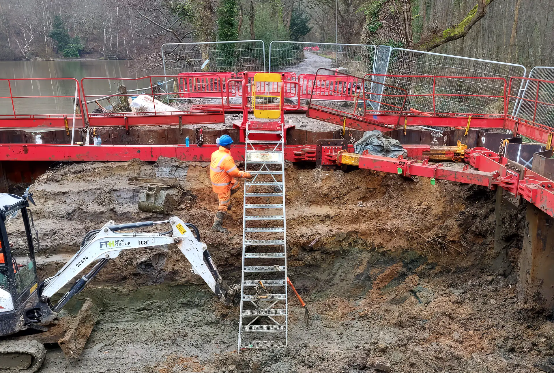 High Water temporary water control system supporting excavation and civil engineering works adjacent to a live watercourse.