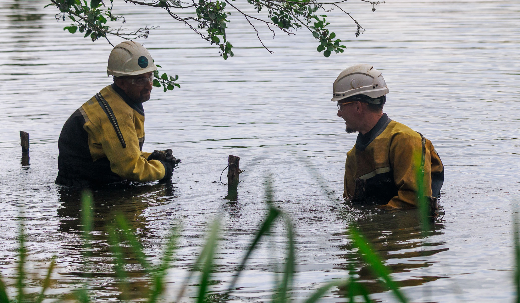 High Water in water team river completing a survey